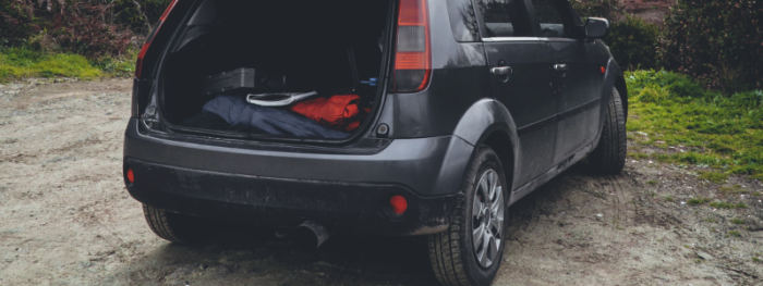 car boot open on a road trip