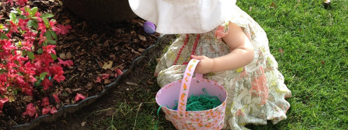 child hunting for eggs during Easter at home