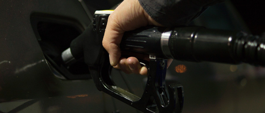 man misfuelling his car at the petrol station