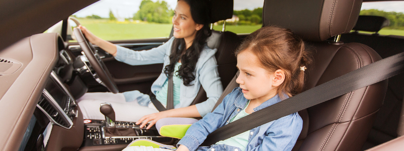 mother and daughter playing a family car game