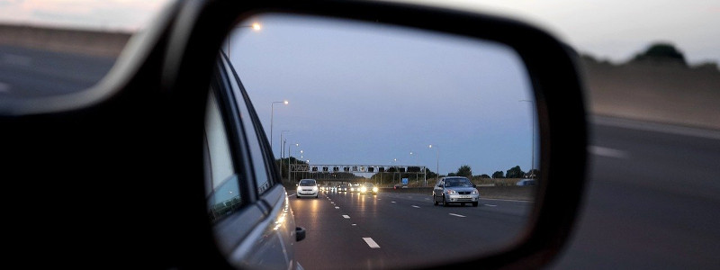 motorway traffic in a wing mirror