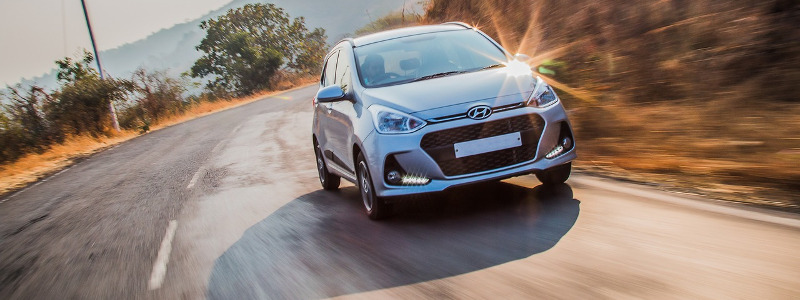 person renting a car to drive around the UK on holiday