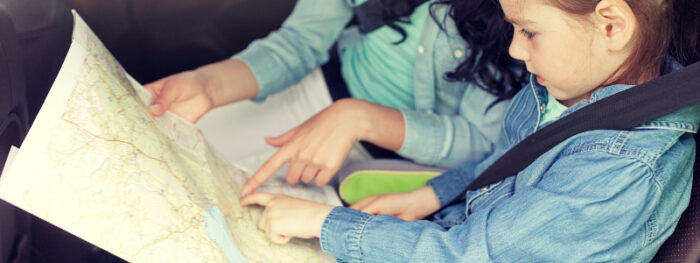 showing child the route is a great family road trip tip