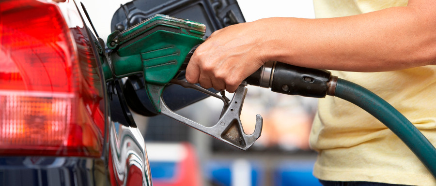 woman misfuelling her car at the petrol station