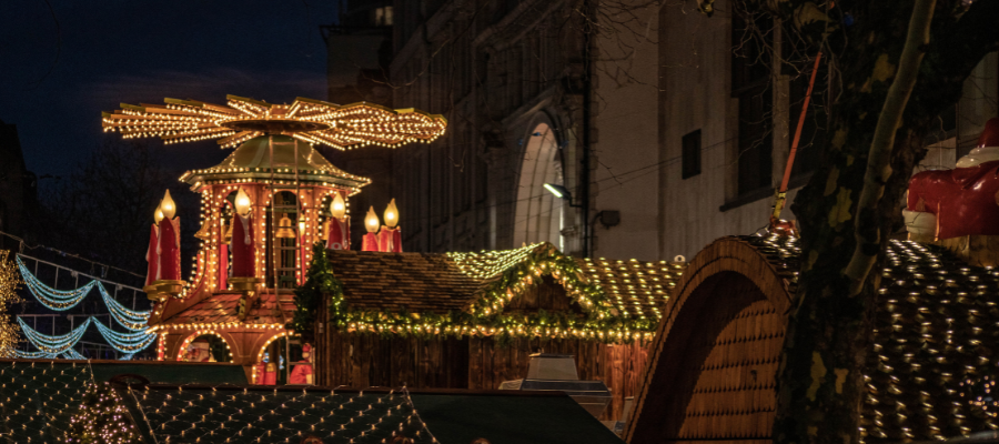 Birmingham christmas market at night with lights