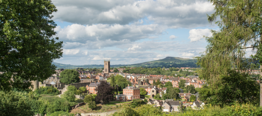 Landscape far away photo of market town of Ludlow